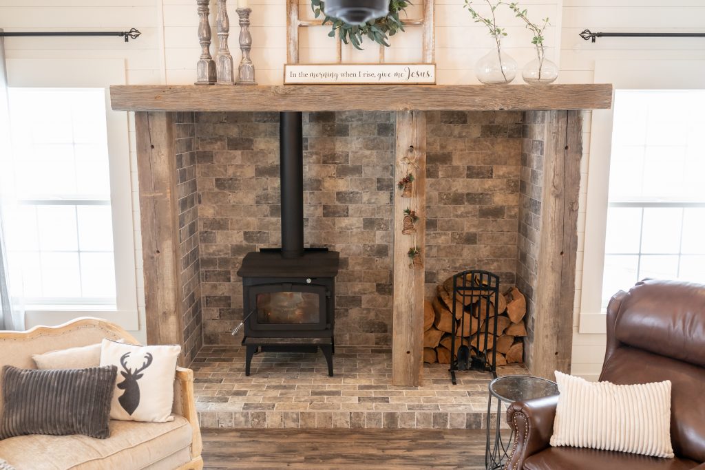 Farmhouse style dreams wood stove with separate wood storage