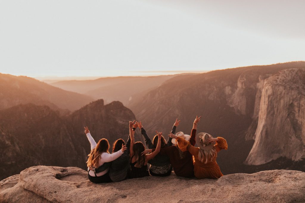 Kalispell Montana photographers pose at Taft Point in Yosemite National Park, California.  Be fearless in pursuit of your dreams